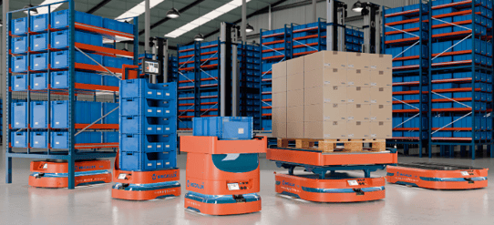 A group of blue automated guided vehicles loaded with containers.