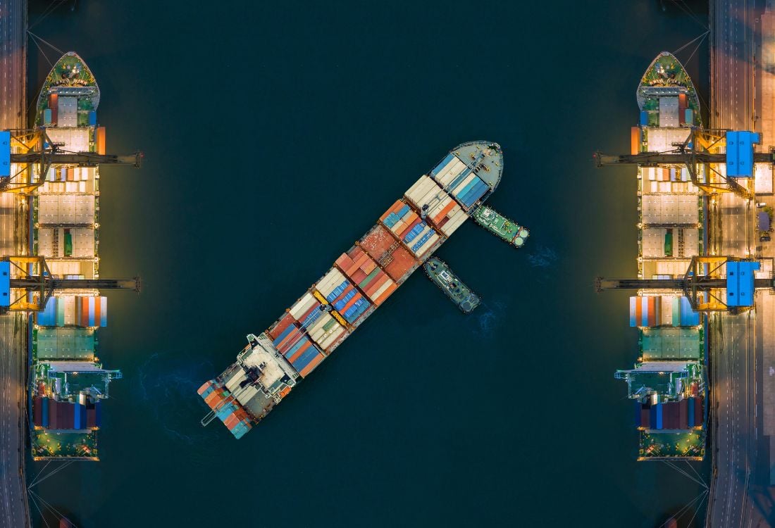 Aerial view container ship from sea port working for delivery containers shipment suitable use for transport or import export to global logistics concept